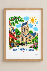 Affiche SAINTE MÈRE L’ÉGLISE illustrée et colorée, présentée dans un cadre en bois clair