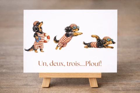 Carte blanche avec trois chiens noirs et fauve en tenue rayée rouge et blanche, dont un bonnet et des lunettes, avec le texte « Un, deux, trois....Plouf! » en bas.