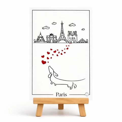 Carte verticale Paris avec cadre noir, frise de monuments stylisés en haut, grand monument central ajouré, cœurs rouges, animal en bas et mot Paris.
